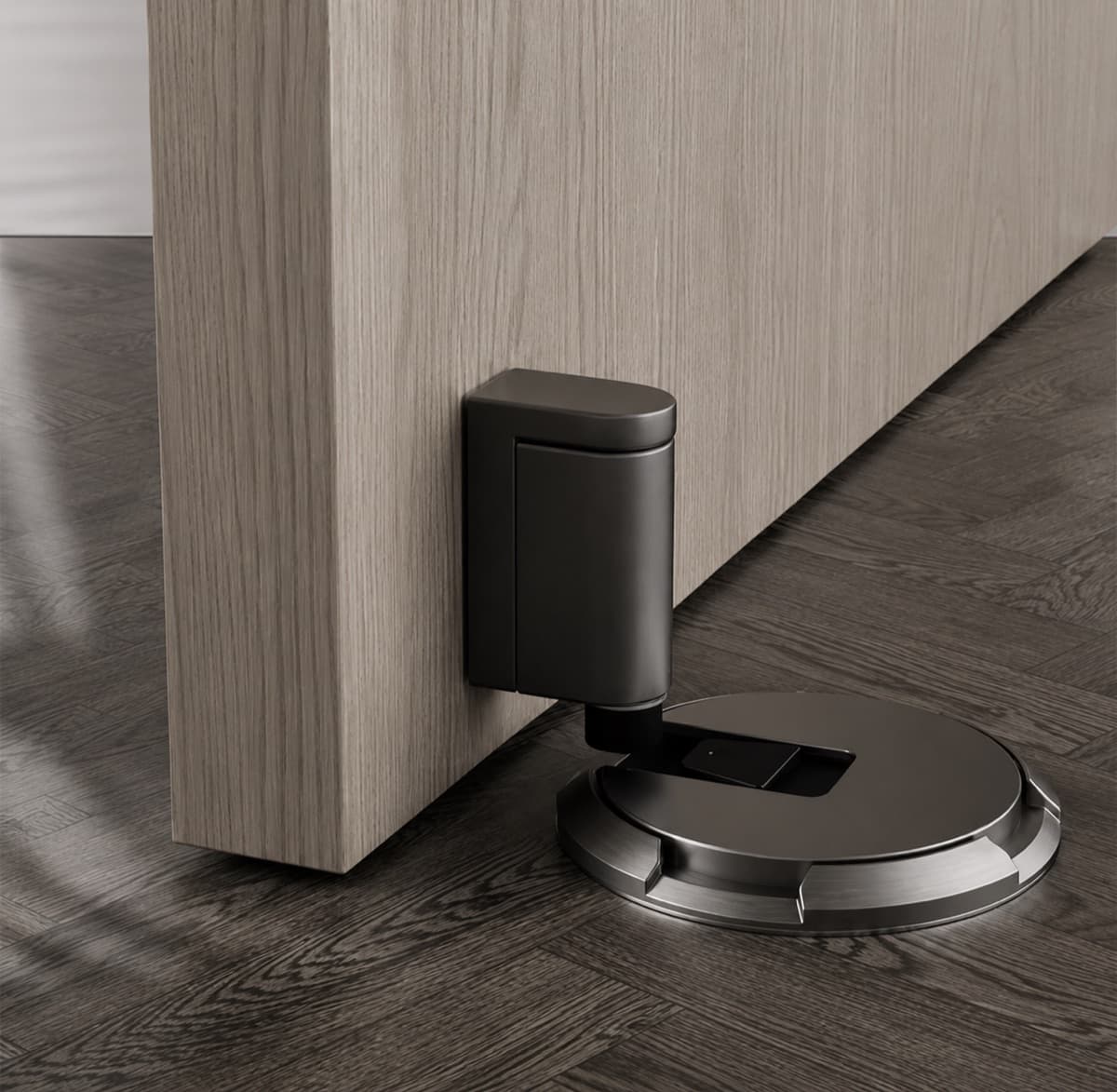 Tope de puerta a piso con retención, montado en la base de una puerta Elekta